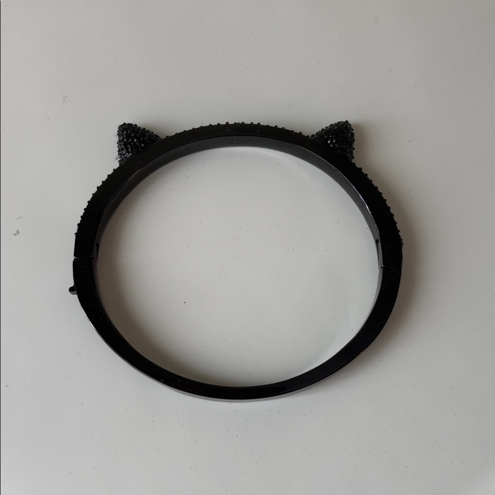 Kate Spade Black Cat Ear Bracelet with stones on top